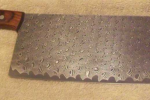 Vegetable cleaver with stainless damascus over CPM-M4 core. 