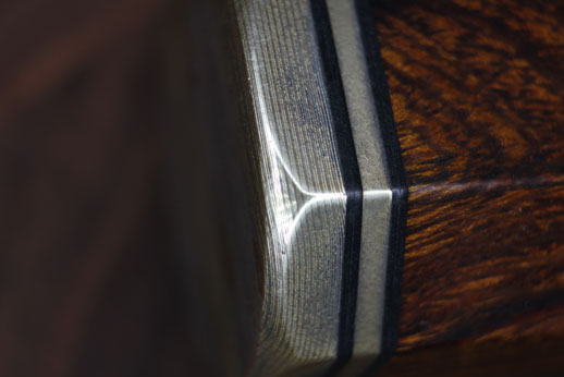 Closeup of Banded Ladder 3 color mokume end cap.