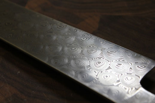 Closeup 300mm Sujihiki's blade in Bubblewrap double carbon.